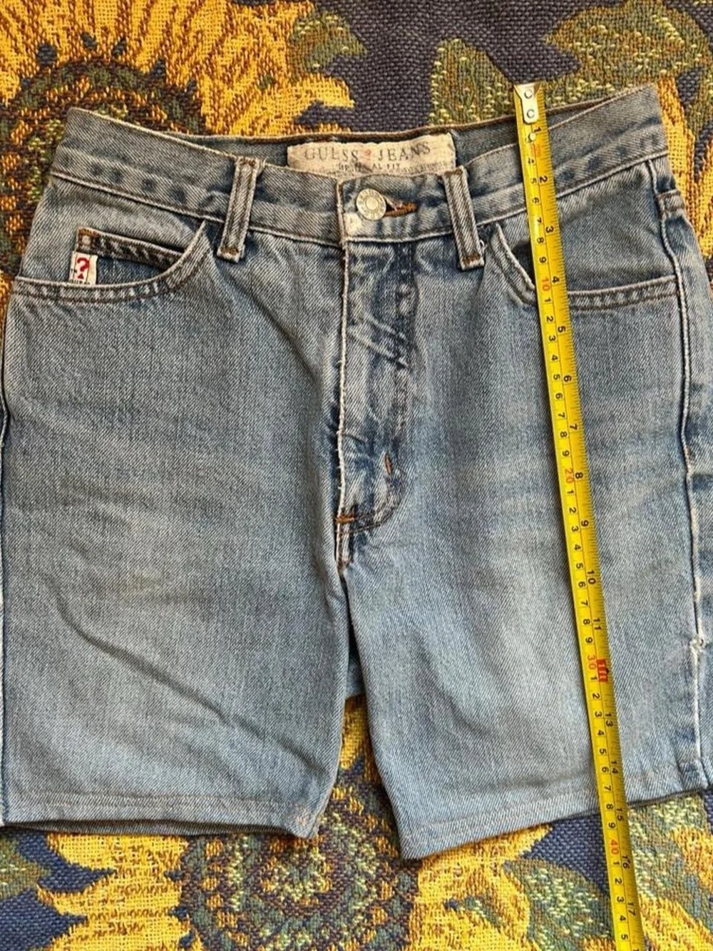 Vintage 1990s GUESS blue light wash 100% cotton denim shorts